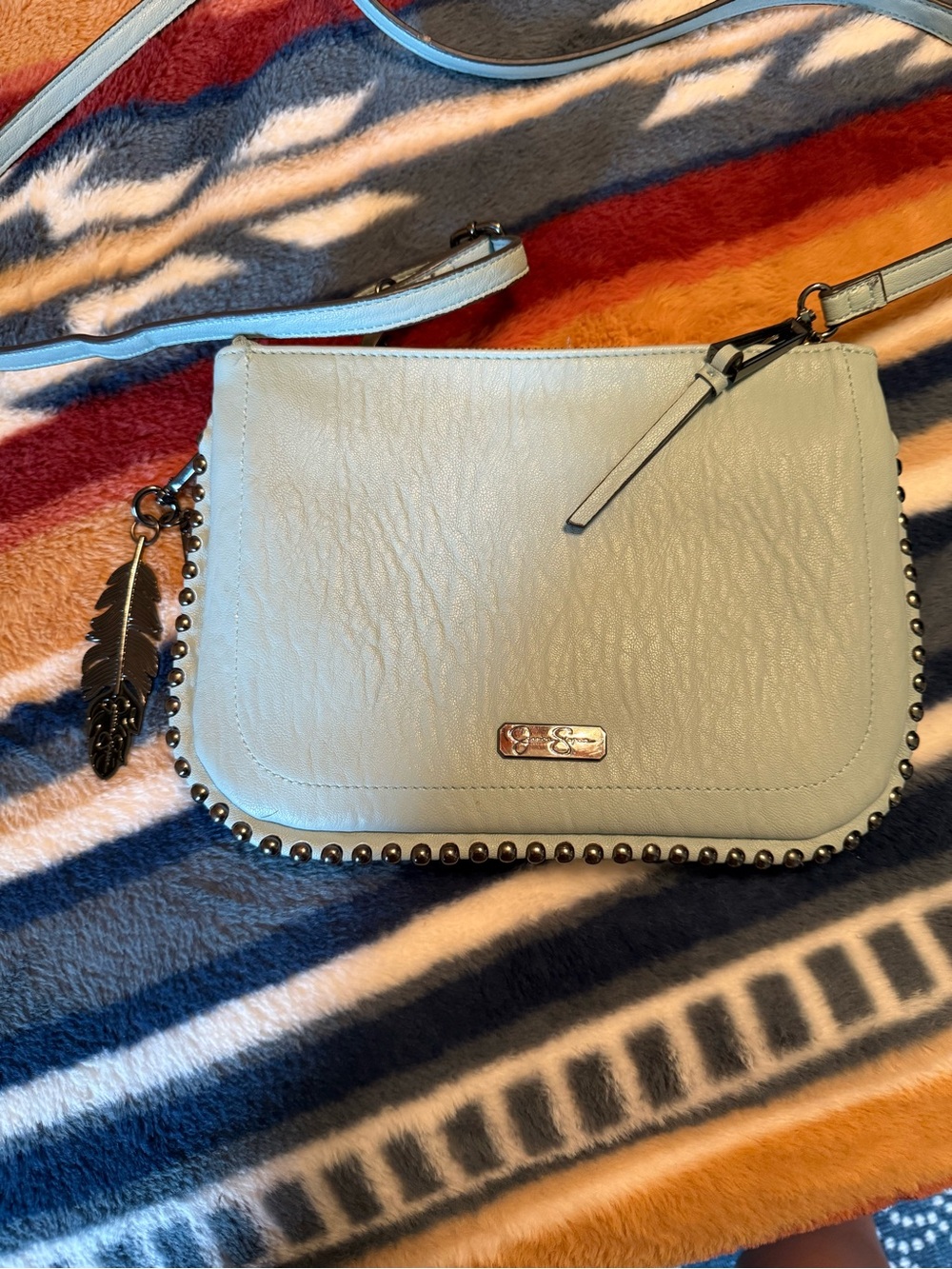 Jessica Simpson brand baby Blue Leather Crossbody Bag with Stud Detail.